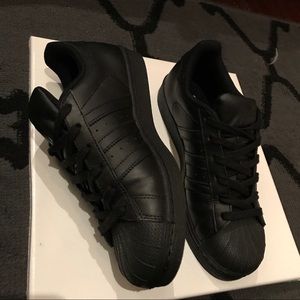 Black Adidas Superstars
